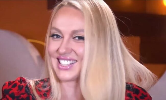 Оля Полякова