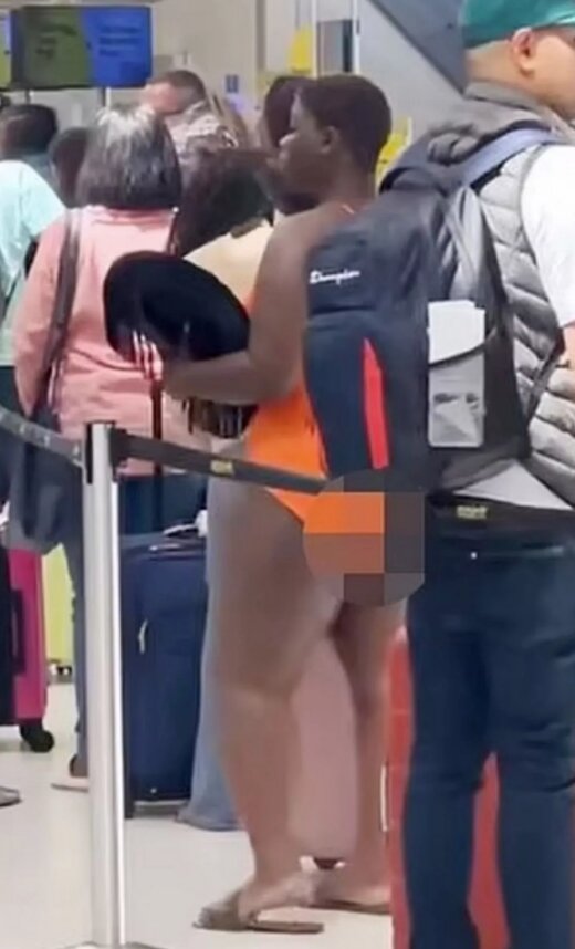 Пасажирка в аеропорту, кадр з відео